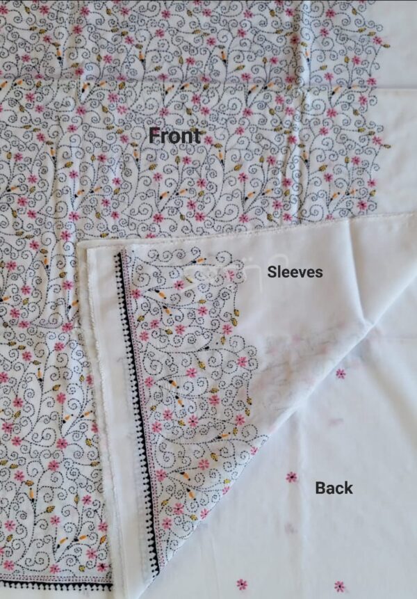 Back and sleeve detail of hand embroidery in ebony and pink on ivory shirt