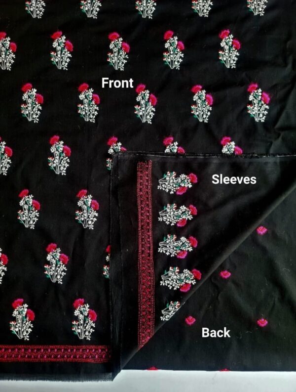 Zoomed-in floral embroidery in red, pink, and white on black lawn shirt