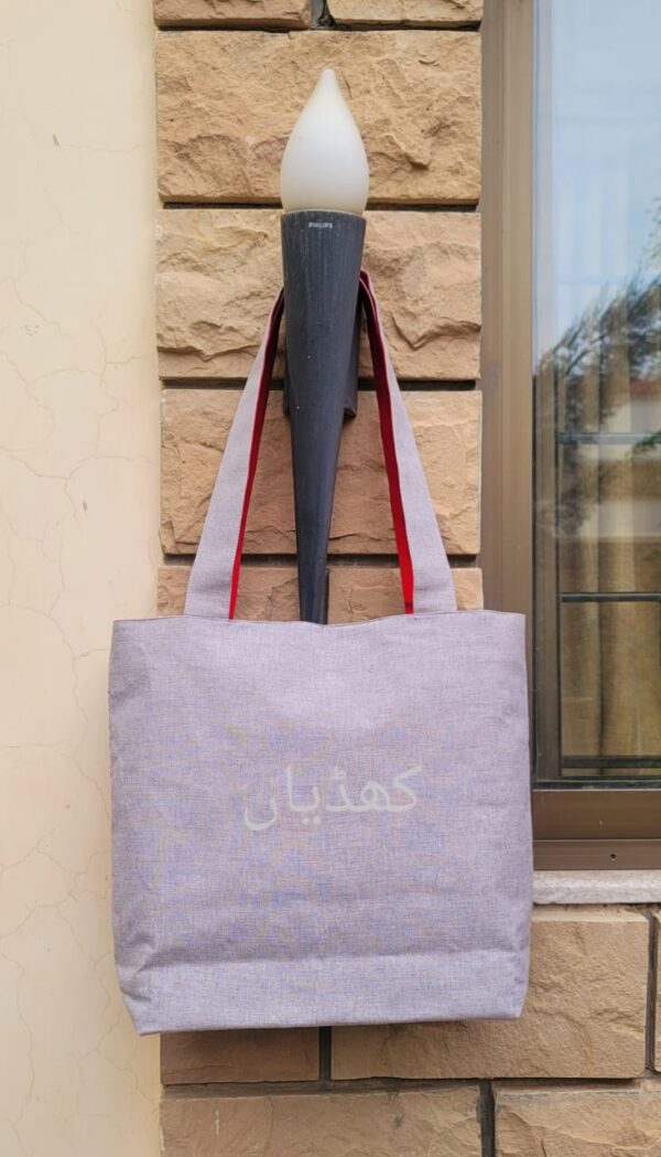 limited-edition-red-floral-geometric-tote-bag-hand-embroidered-elegance-pakistan-backside