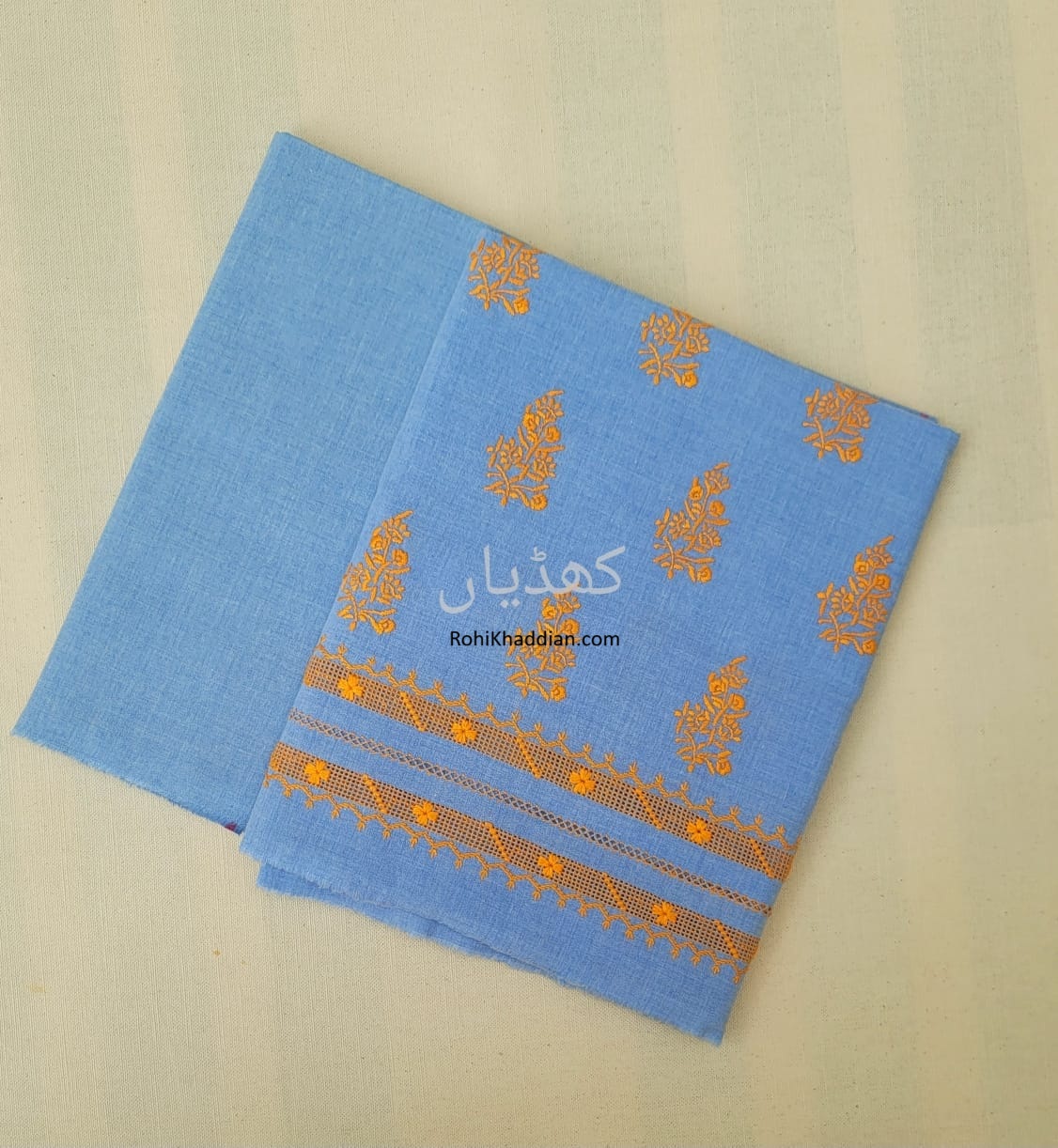 Sky Blue hand embroidered hand woven cotton two piece unstitched suit with Tarkashi detailing for winter Pakistan