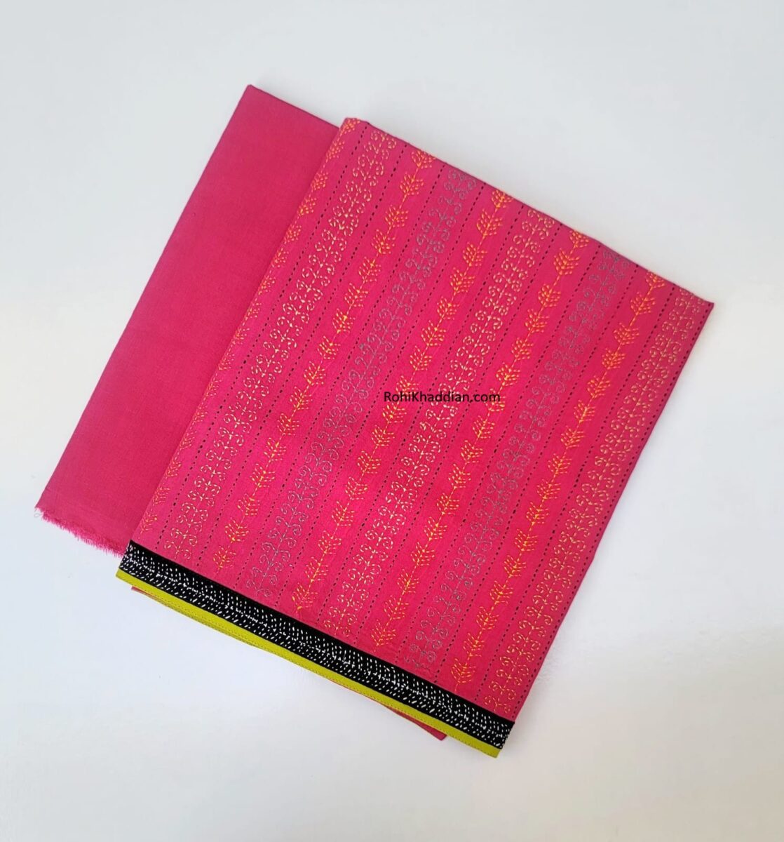 Fuchsia pink hand woven cotton suit with golden yellow Kantha Kari embroidery and contrasting black and white border by Rohi Ki Khaddian Pakistan. Copy file name