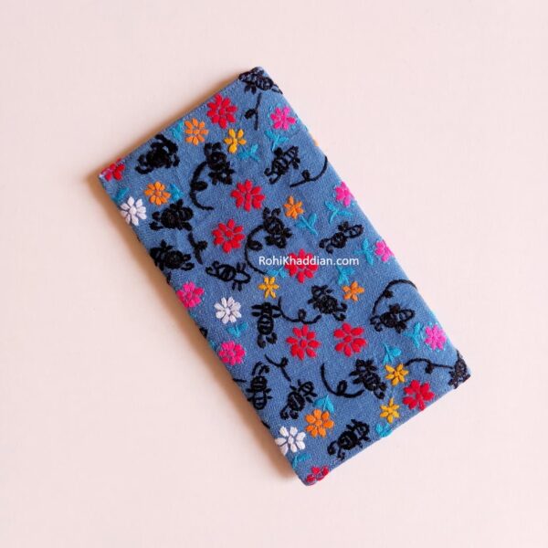 Night Florals embroidered wallet for women featuring colorful flowers and black botanical embroidery on a blue background